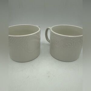 Pair Of Pier 1 Coffee Mugs White raised Fruit grape pears strawberries design
